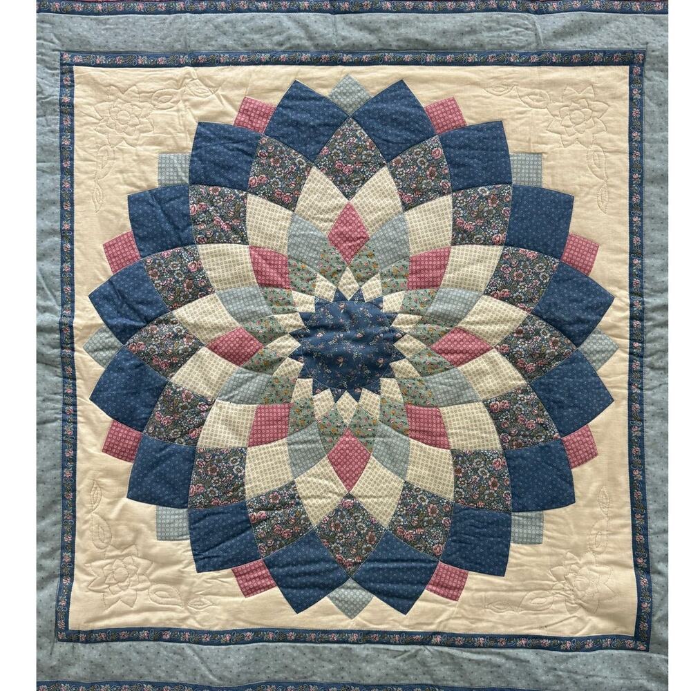 Elegant Blue and Cream Patchwork Quilt
